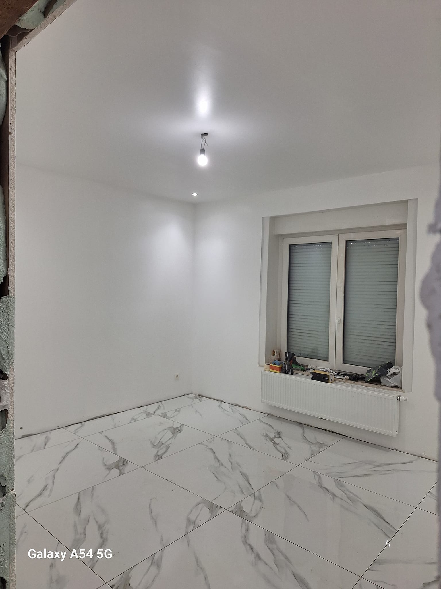 Rénovation pièce carrelage et peinture Schaerbeek